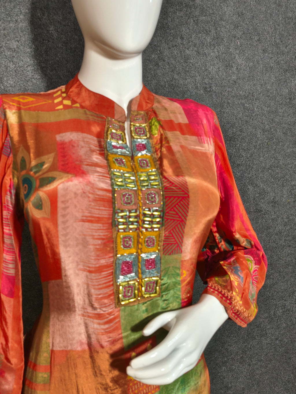 Orange Patchwork Kurta Set – Traditional Ethnic Wear with Embroidered Neckline & Reddish-Brown Pants