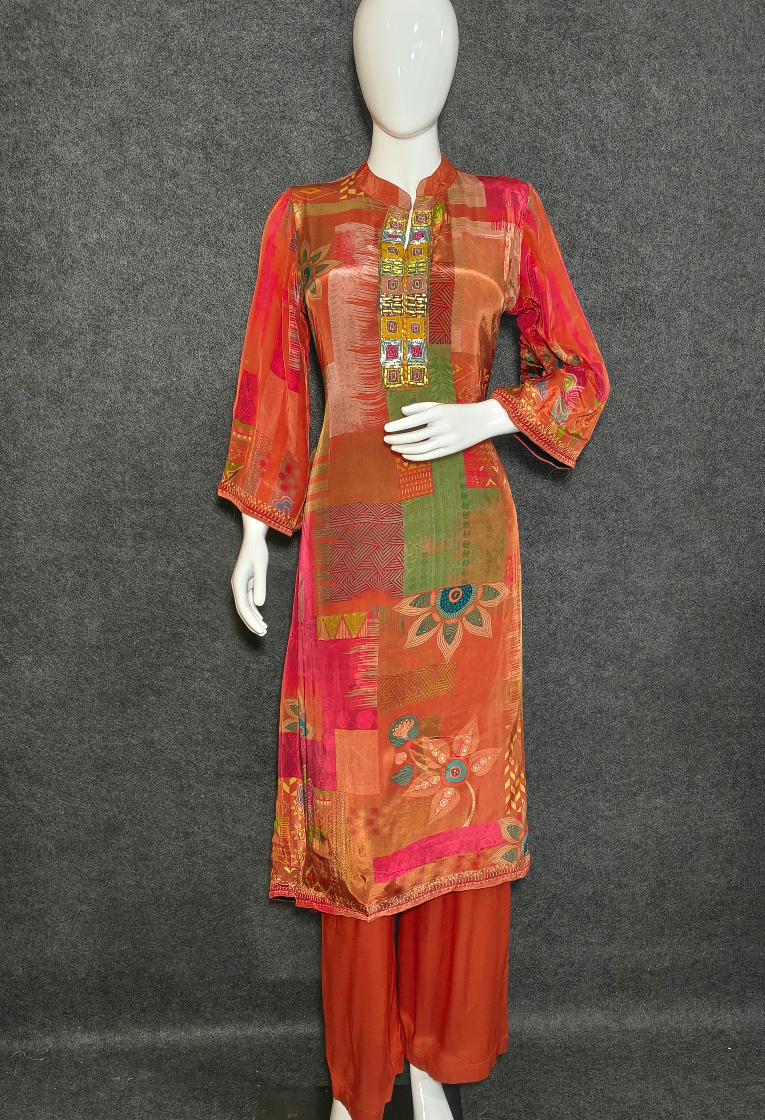 Orange Patchwork Kurta Set – Traditional Ethnic Wear with Embroidered Neckline & Reddish-Brown Pants